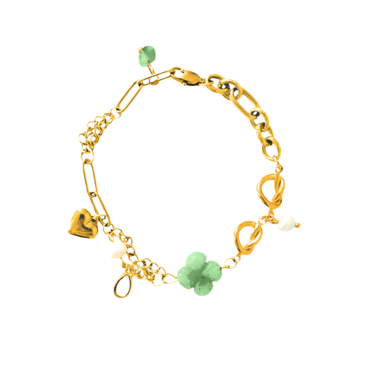 An exquisite asymmetric charm bracelet featuring layered gold chains, natural stones, and freshwater pearls, ideal for adding a unique touch to any outfit.