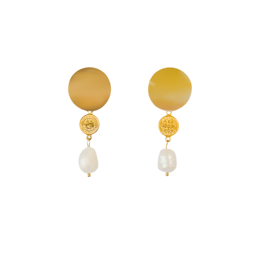 Elegant handmade pearl earrings featuring 18k Gold PVD plated stainless steel, showcasing a round gold disc and natural freshwater pearls, perfect for seaside-inspired jewellery.